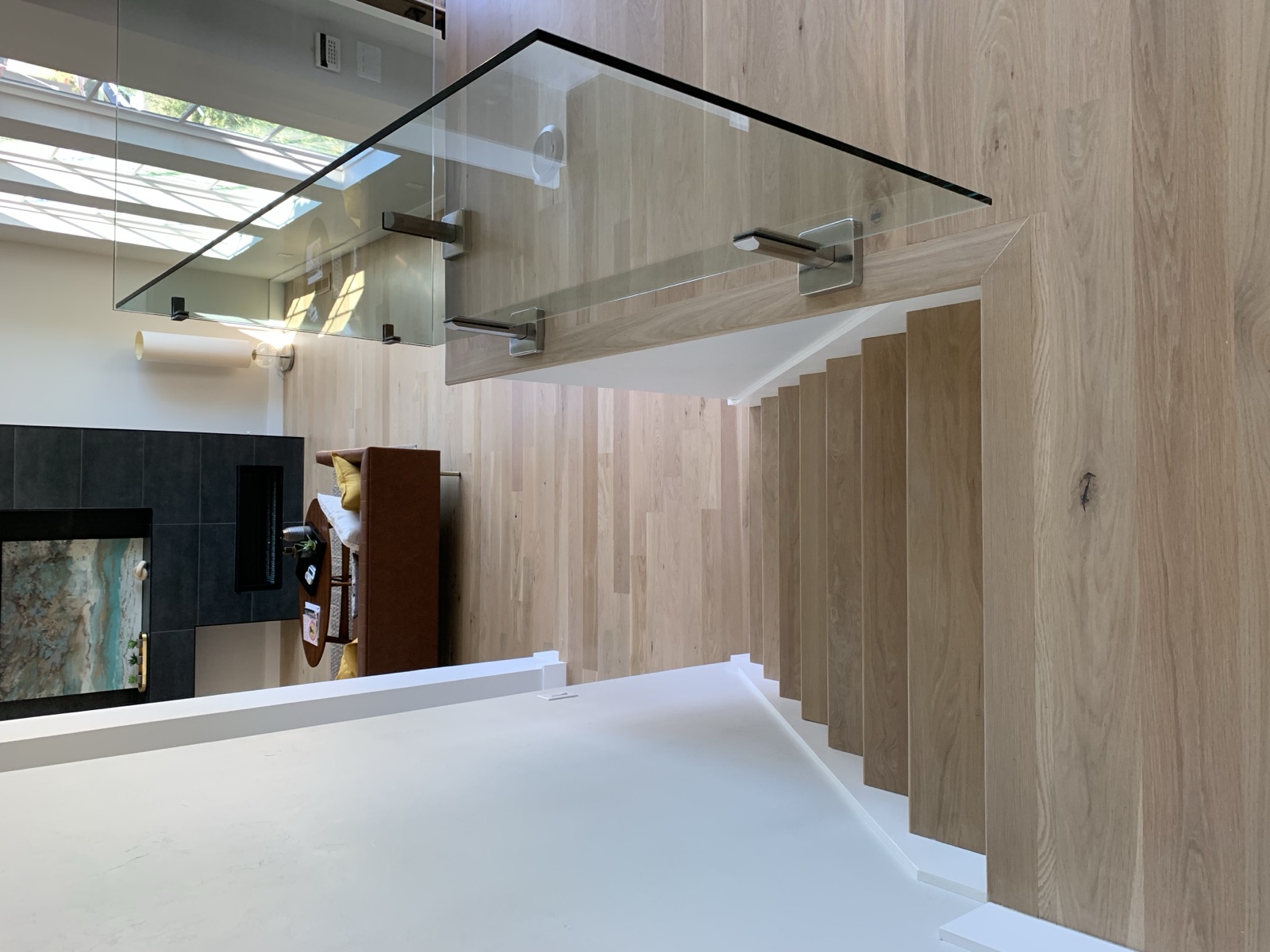 White oak staircase with glass railing